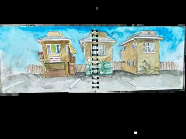Watercolor illustration of three vintage beach houses with a spiral notebook binding down the center