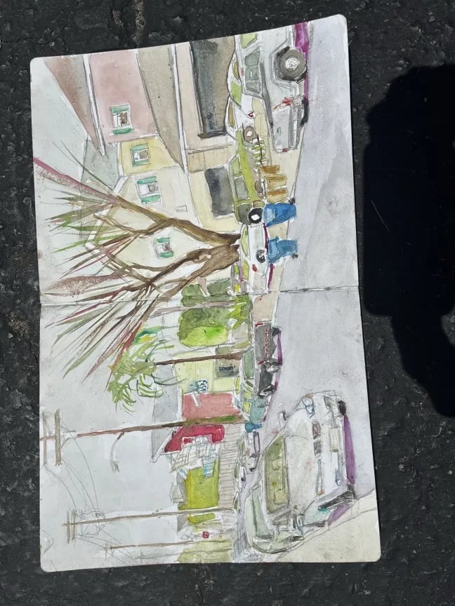 Watercolor sketch of a residential street scene with houses, trees, cars, and utility poles