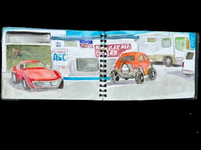 Sketchbook spread showing watercolor drawings of a red sports car and an orange car at a repair shop